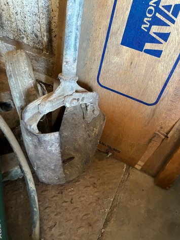 Image for Montgomery Ward wood shop creeper and post hole digger