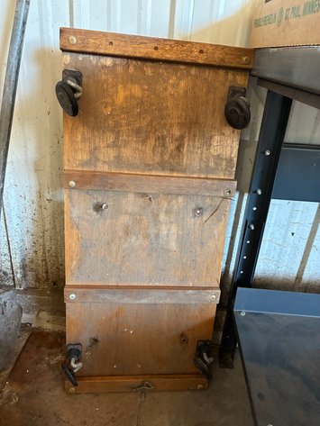 Image for Montgomery Ward wood shop creeper and post hole digger