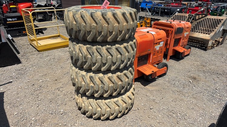 Image for QTY(4) 12-16.5 TIRES ON 8 LUG WHEELS