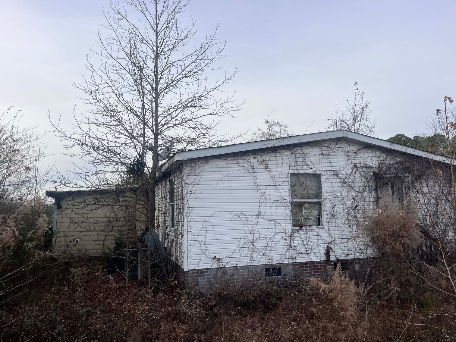 Image for Over 7 acres with a Manufactured Home Selling at Public Auction in Harnett County on 1530 Clark Road, Lillington, NC.