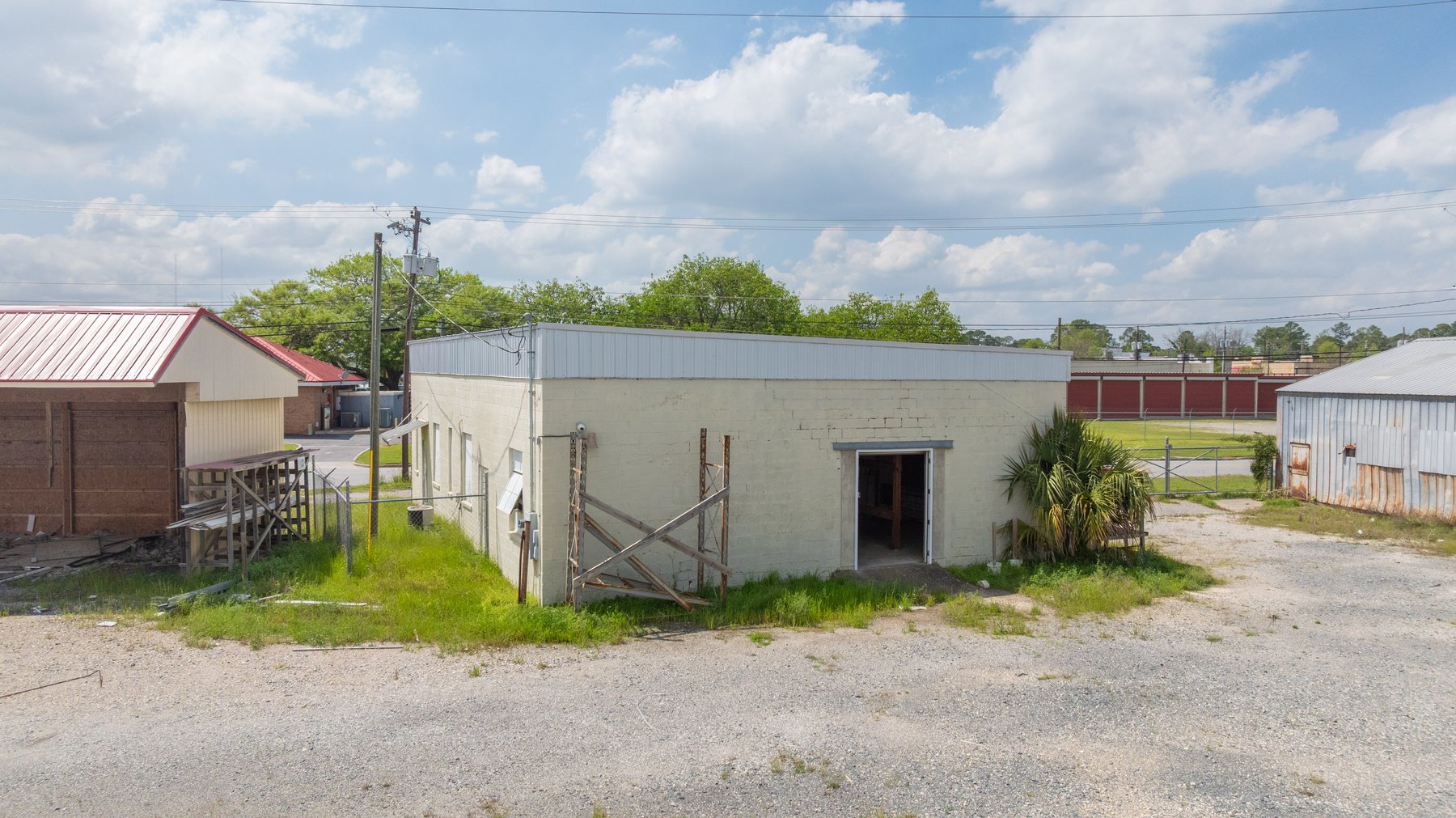 Image for High-Traffic Commercial Property on 2.4+/- Acres - Prime Retail & Warehouse Space - 30,060+/- Total Building SF Offered Divided & as a Whole