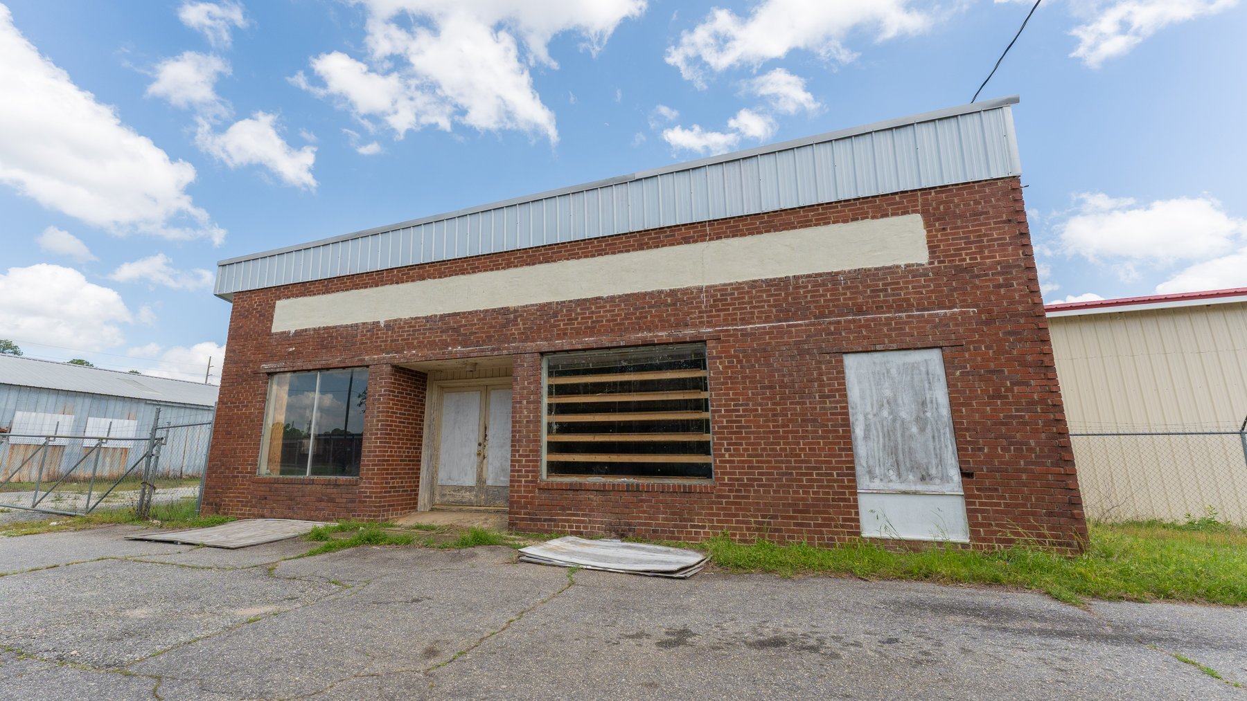 Image for High-Traffic Commercial Property on 2.4+/- Acres - Prime Retail & Warehouse Space - 30,060+/- Total Building SF Offered Divided & as a Whole
