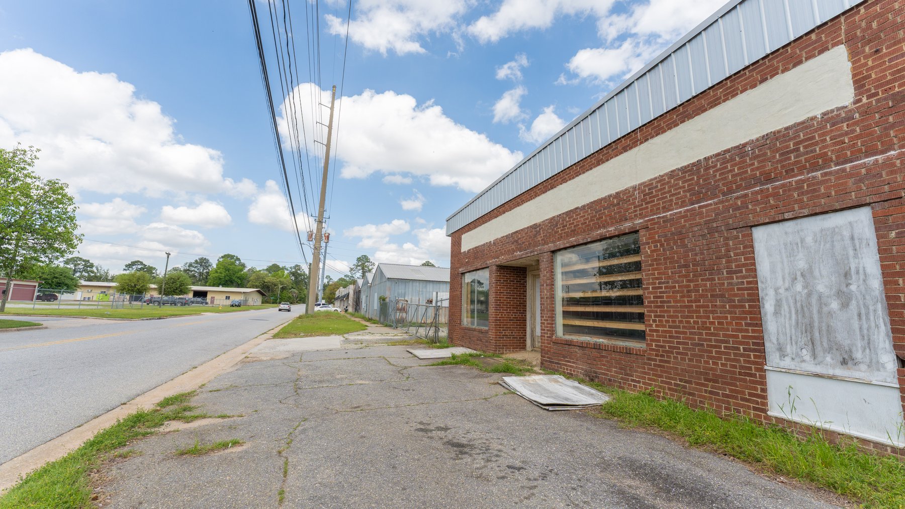 Image for High-Traffic Commercial Property on 2.4+/- Acres - Prime Retail & Warehouse Space - 30,060+/- Total Building SF Offered Divided & as a Whole