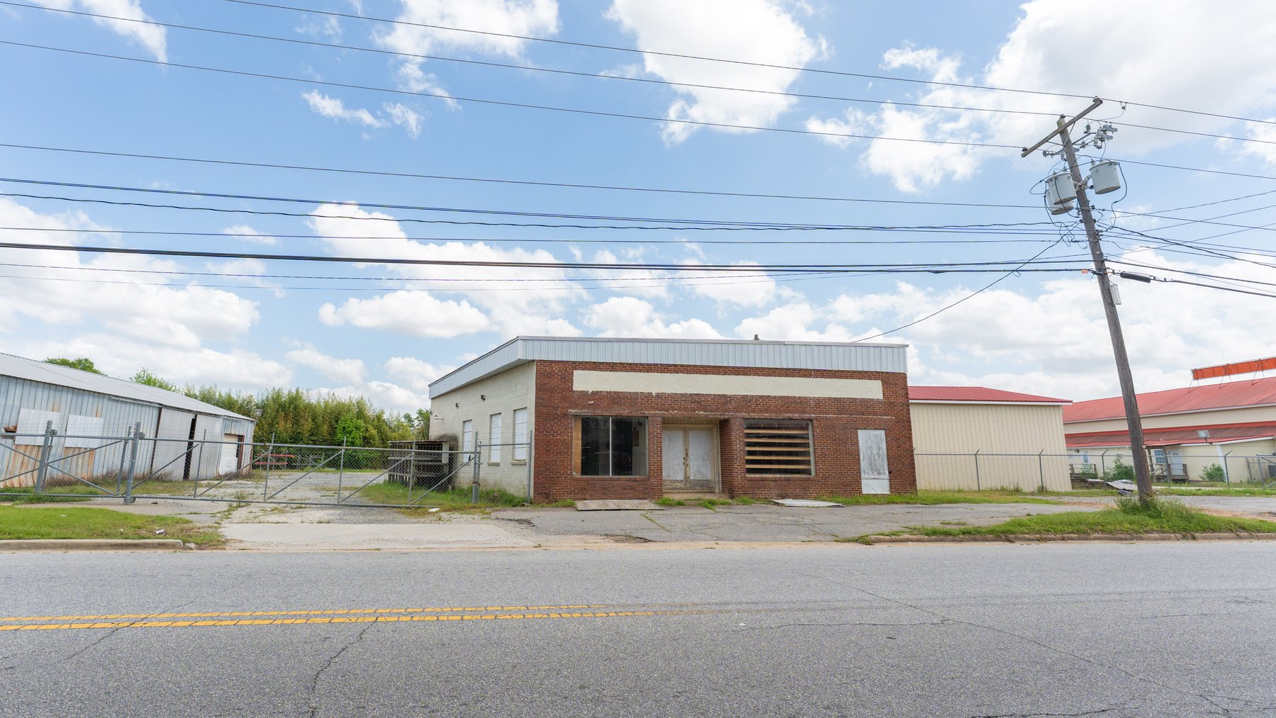 Image for High-Traffic Commercial Property on 2.4+/- Acres - Prime Retail & Warehouse Space - 30,060+/- Total Building SF Offered Divided & as a Whole