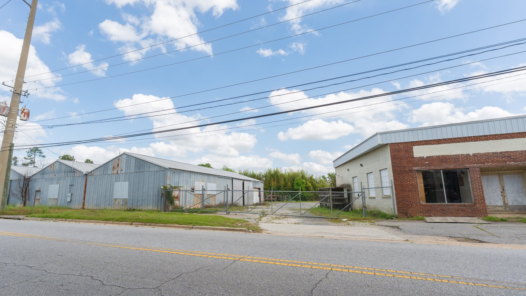 Image for High-Traffic Commercial Property on 2.4+/- Acres - Prime Retail & Warehouse Space - 30,060+/- Total Building SF Offered Divided & as a Whole