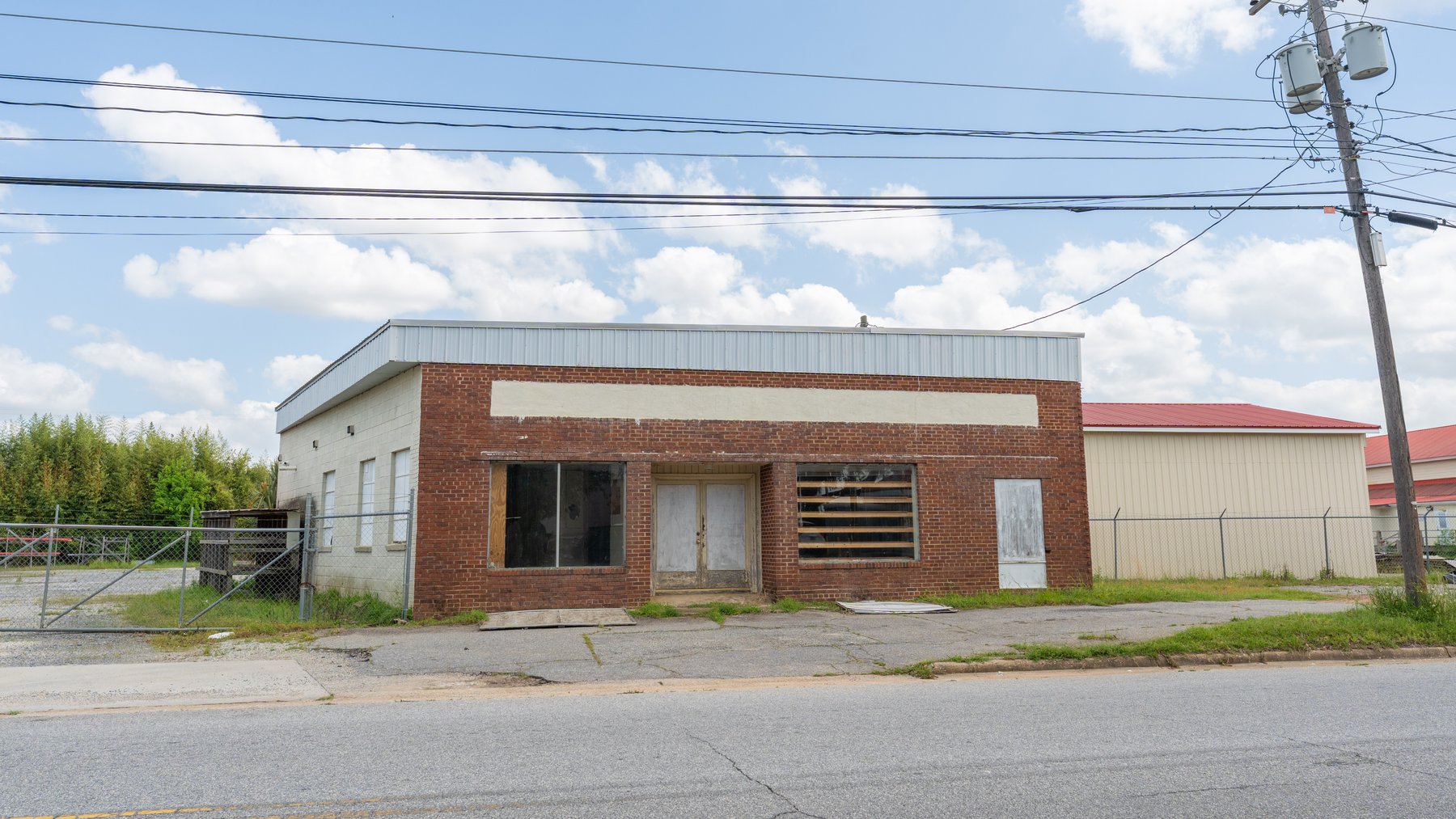 Image for High-Traffic Commercial Property on 2.4+/- Acres - Prime Retail & Warehouse Space - 30,060+/- Total Building SF Offered Divided & as a Whole