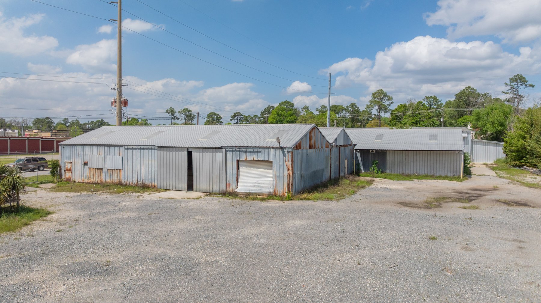 Image for High-Traffic Commercial Property on 2.4+/- Acres - Prime Retail & Warehouse Space - 30,060+/- Total Building SF Offered Divided & as a Whole