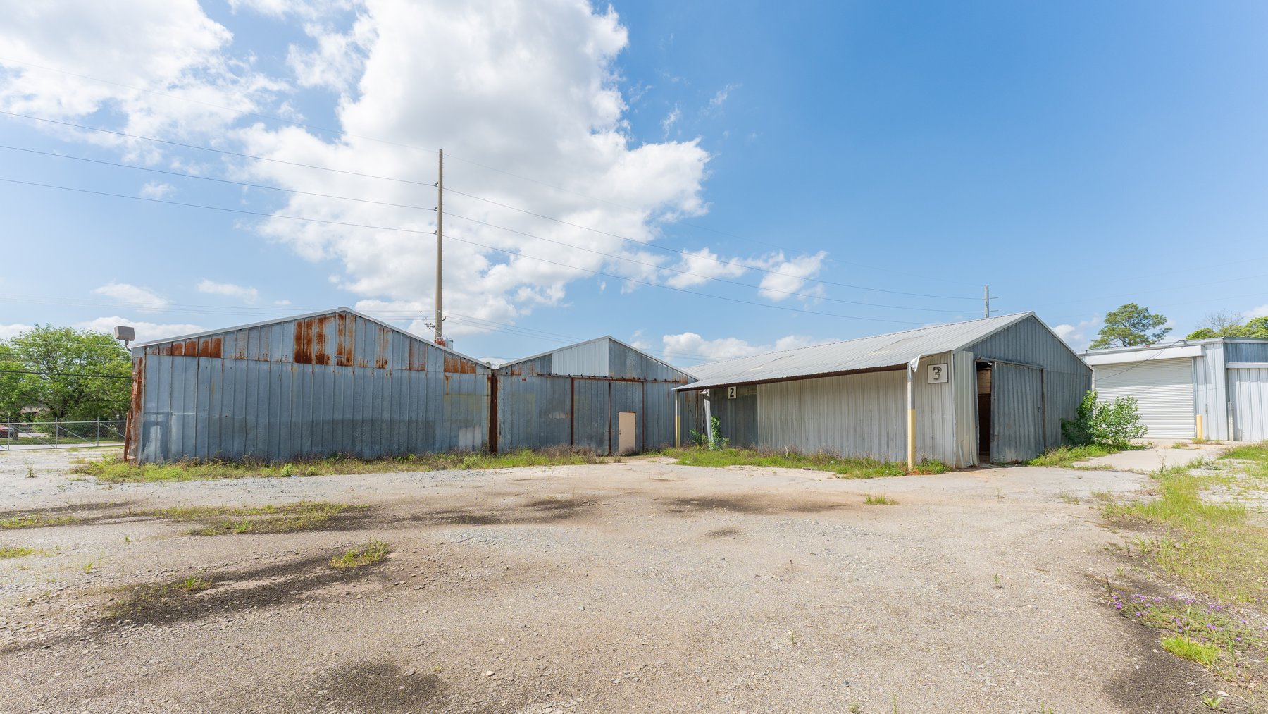 Image for High-Traffic Commercial Property on 2.4+/- Acres - Prime Retail & Warehouse Space - 30,060+/- Total Building SF Offered Divided & as a Whole