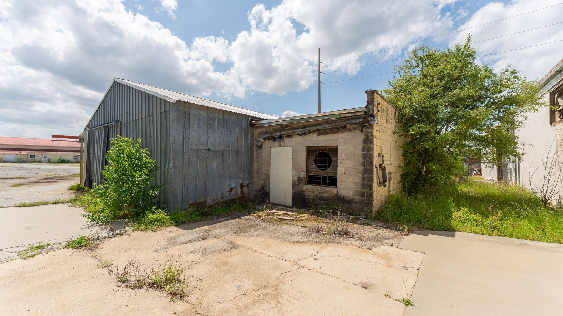 Image for High-Traffic Commercial Property on 2.4+/- Acres - Prime Retail & Warehouse Space - 30,060+/- Total Building SF Offered Divided & as a Whole