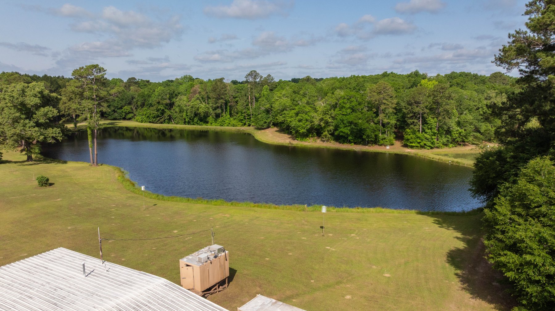 Image for 176+/- Acres - 6,546+/- SF Custom Lodge w/ Stocked Ponds & Food Plots - Mature Timber & Rocky Creek Frontage