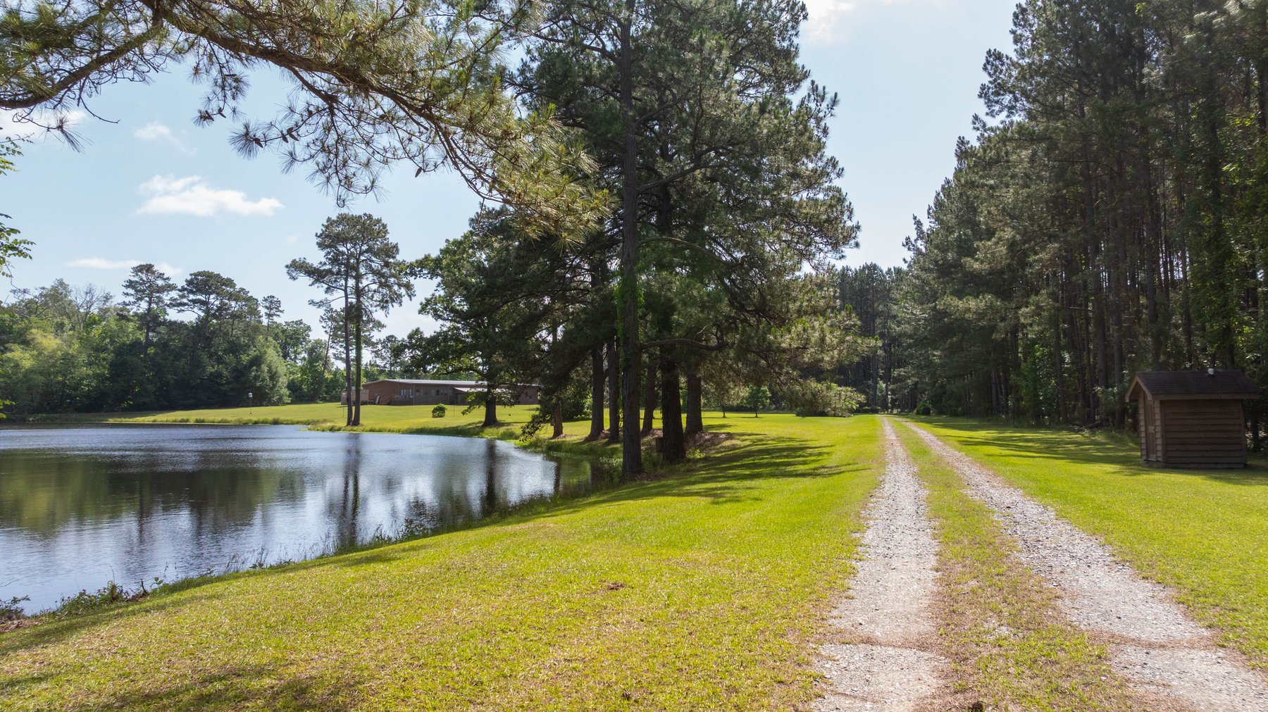 Image for 176+/- Acres - 6,546+/- SF Custom Lodge w/ Stocked Ponds & Food Plots - Mature Timber & Rocky Creek Frontage
