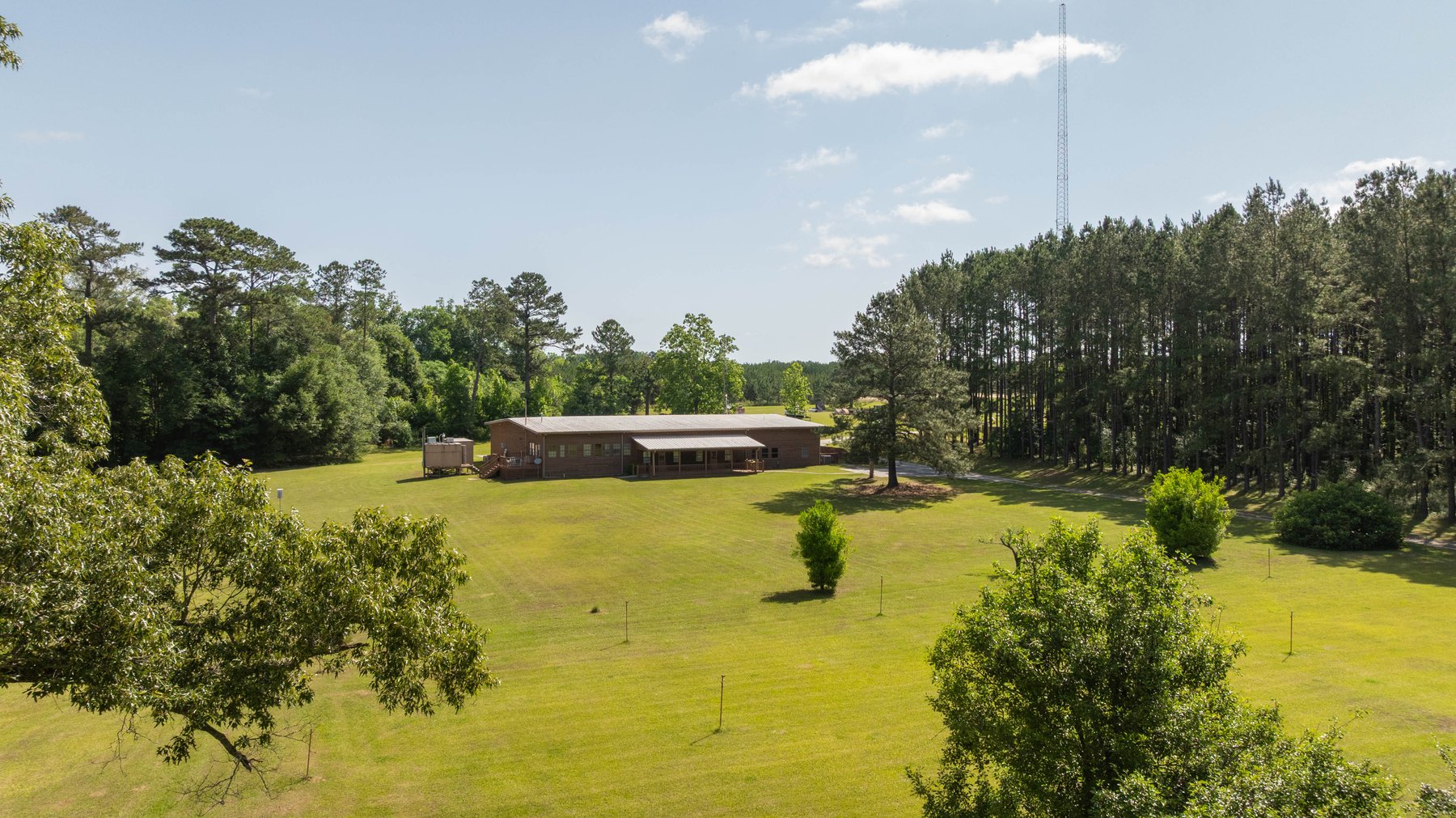 Image for 176+/- Acres - 6,546+/- SF Custom Lodge w/ Stocked Ponds & Food Plots - Mature Timber & Rocky Creek Frontage