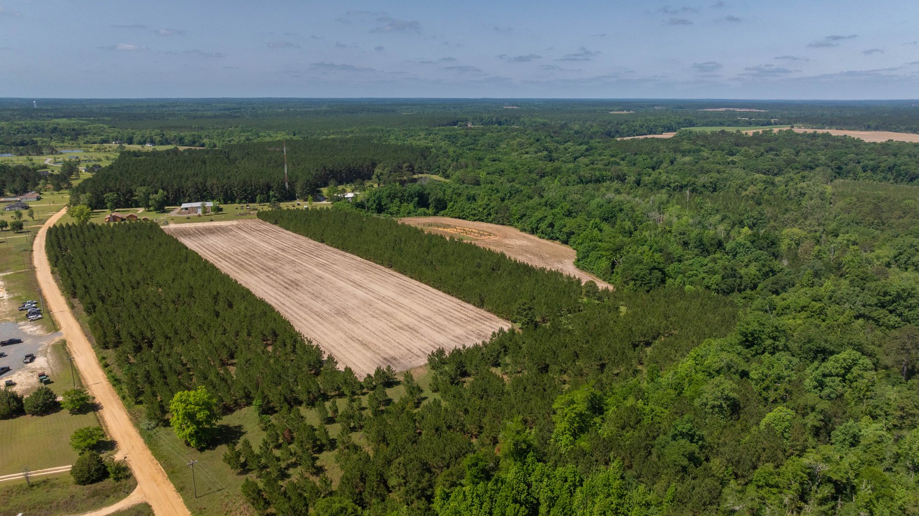Image for 176+/- Acres - 6,546+/- SF Custom Lodge w/ Stocked Ponds & Food Plots - Mature Timber & Rocky Creek Frontage