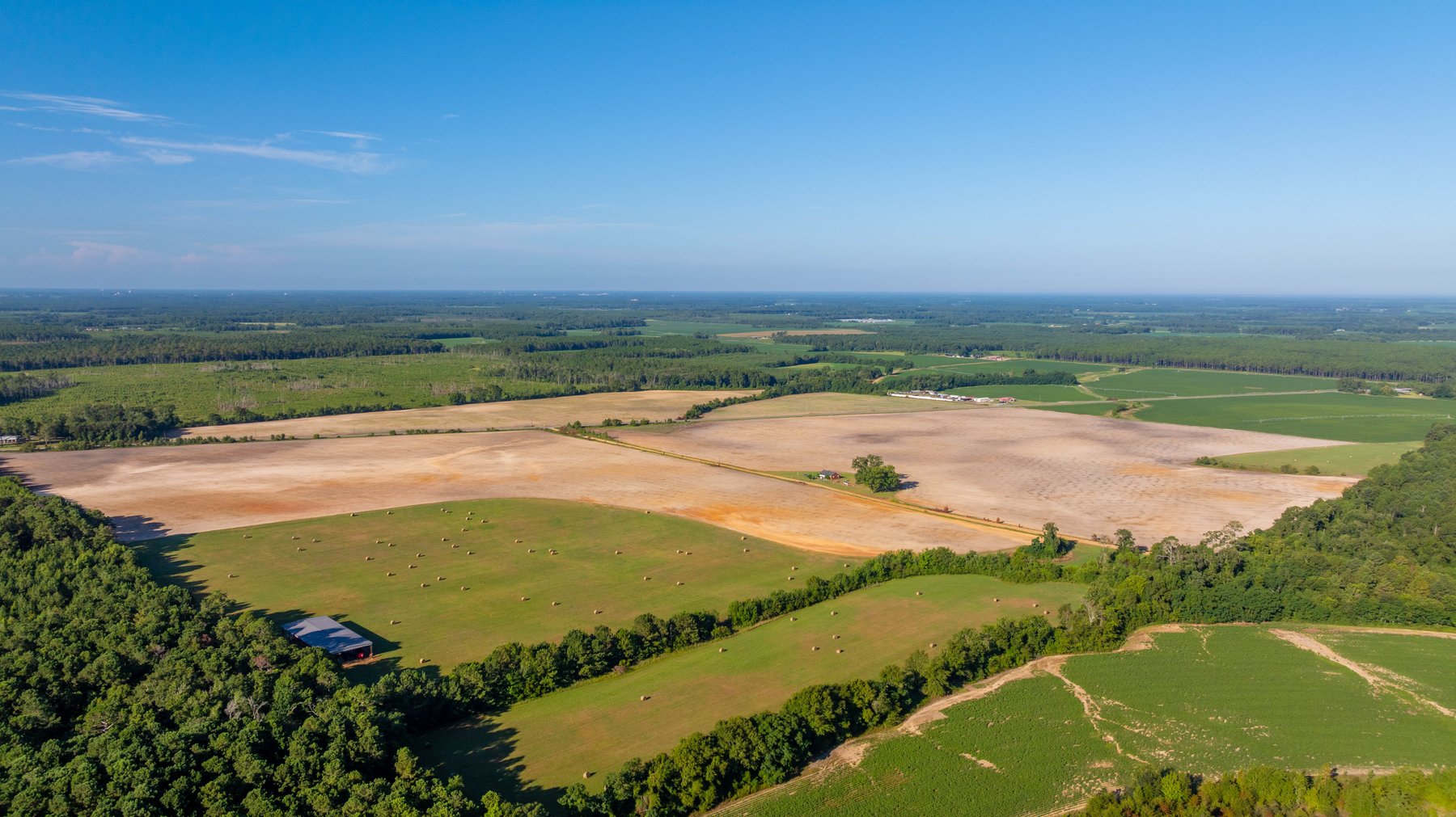 Image for 224+/- Total Acres – The Bowen Farm - Productive Farmland w/ Brick Home, Coastal Hayfields & Large Metal Building