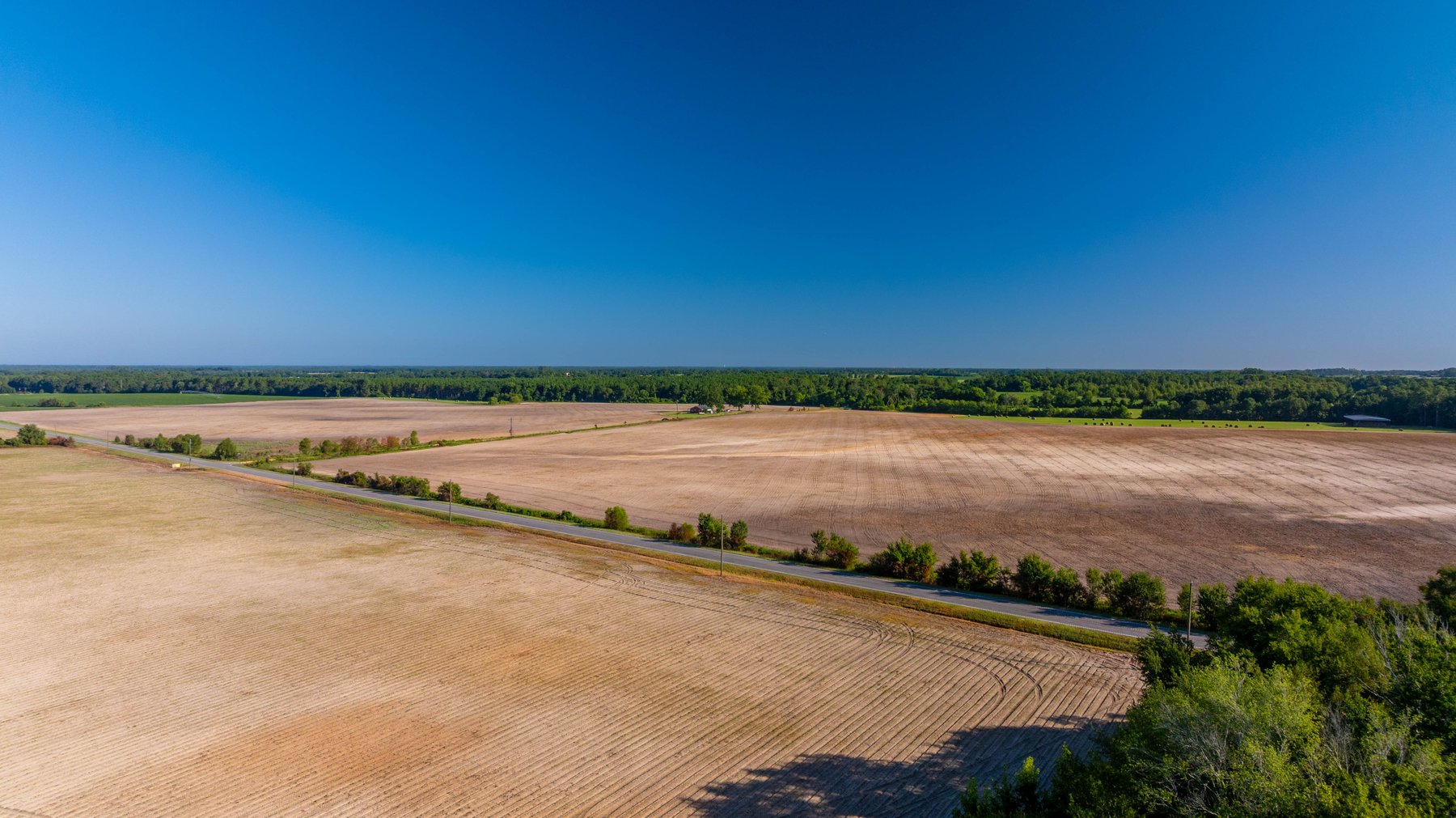 Image for 224+/- Total Acres – The Bowen Farm - Productive Farmland w/ Brick Home, Coastal Hayfields & Large Metal Building