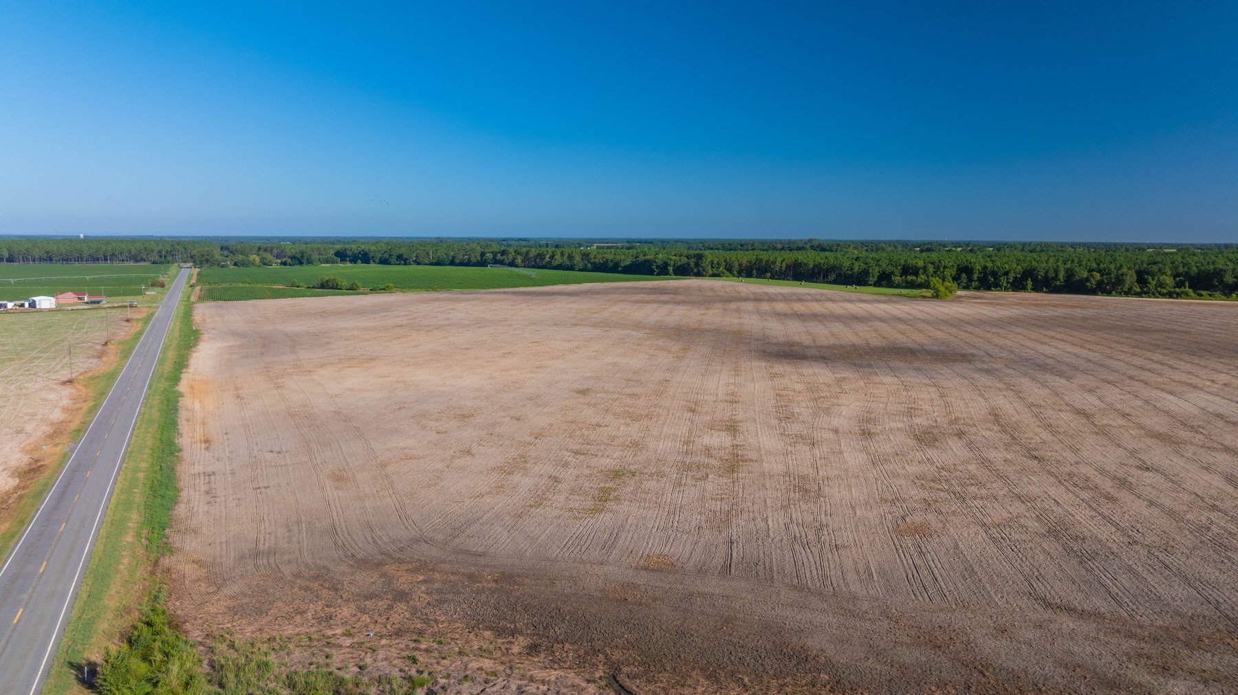 Image for 224+/- Total Acres – The Bowen Farm - Productive Farmland w/ Brick Home, Coastal Hayfields & Large Metal Building