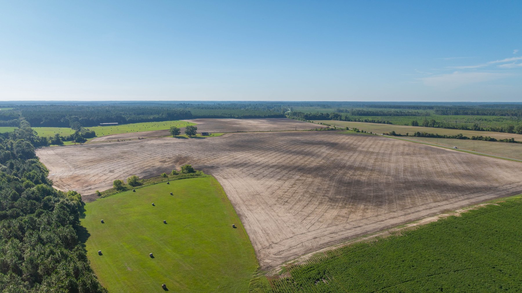 Image for 224+/- Total Acres – The Bowen Farm - Productive Farmland w/ Brick Home, Coastal Hayfields & Large Metal Building