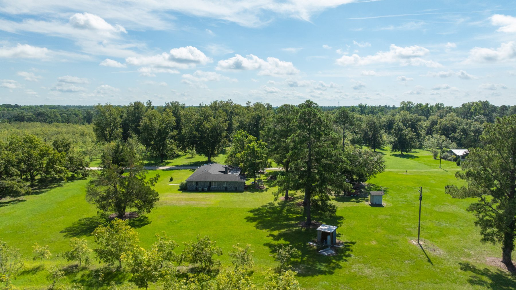 Image for 235± Acres – Woodard Orchard - Irrigated Pecan Orchard with Pond,  Homes, Buildings & Improvements - Prime Development Potential