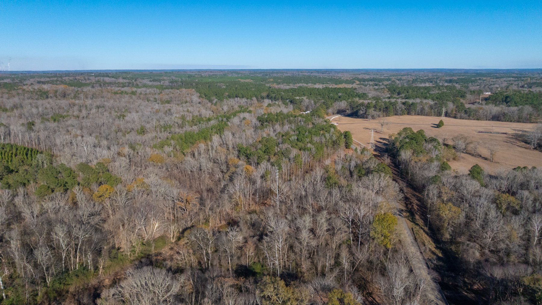 Image for Margaret Kenworthy Estate - 199+/- Total Acres - 1,760 SF Southern Charm Home - Planted Pine, Hardwoods & Pond - Echeconnee Creek Frontage