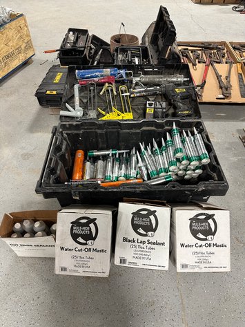 Image for Assorted Roofing Adhesives, Sealants and Tools in Rolling Tool Box