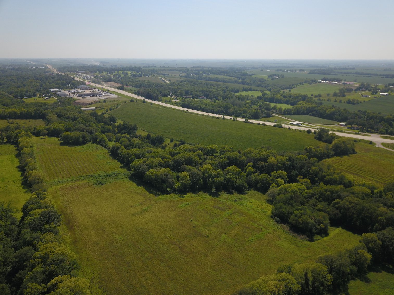 Image for IN PERSON/ONLINE HIGHLY VISIBLE HIGHWAY FRONTAGE DEVELOPMENT POTENTIAL FARMLAND AUCTION