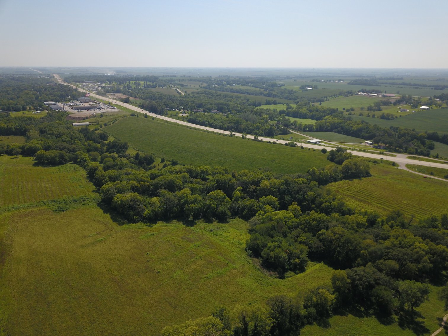 Image for IN PERSON/ONLINE HIGHLY VISIBLE HIGHWAY FRONTAGE DEVELOPMENT POTENTIAL FARMLAND AUCTION