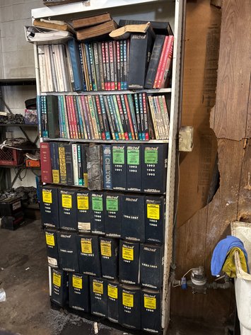 Image for Chiltons and Mitchells auto reference manuals and shelf