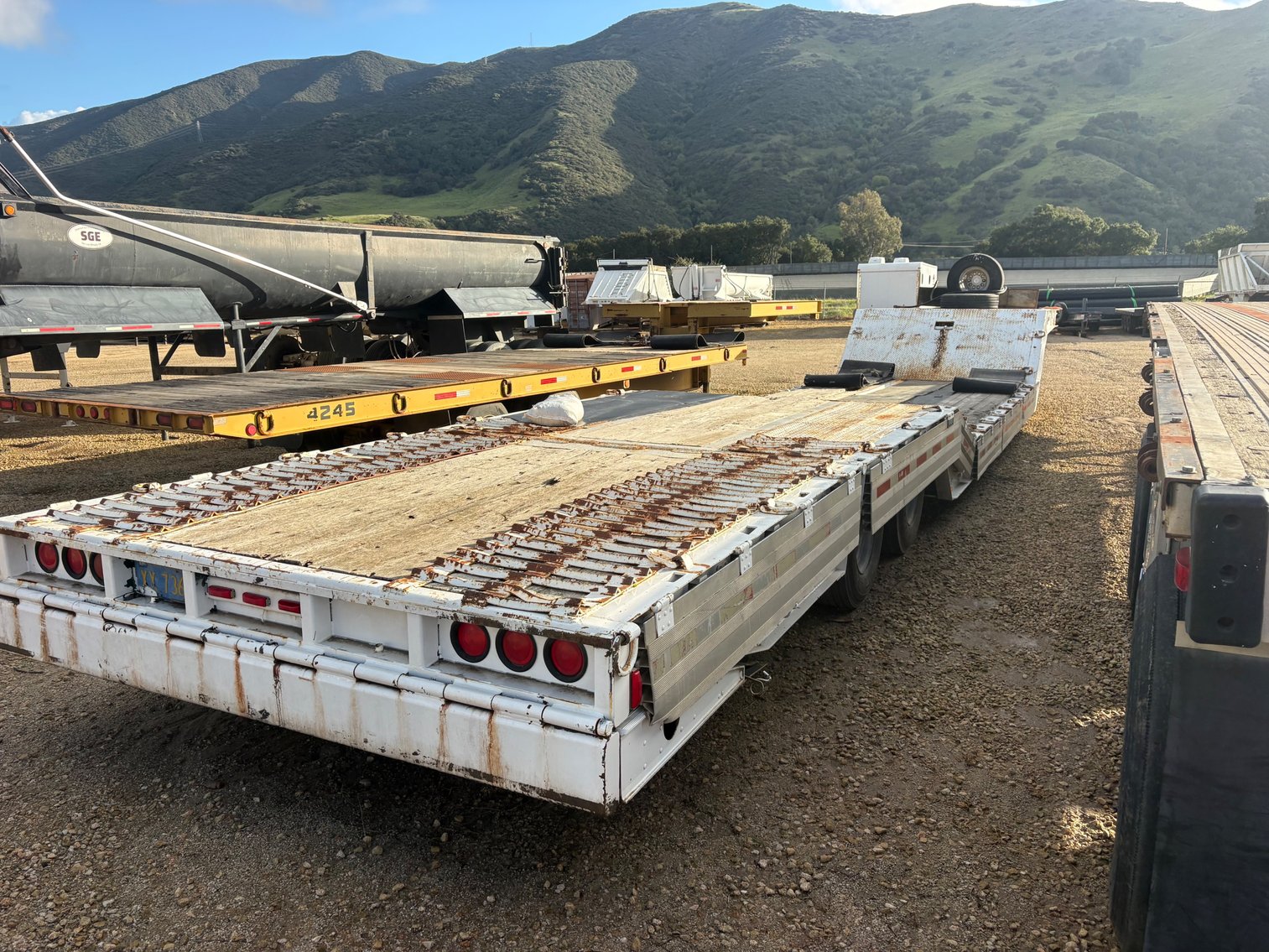 Image for Wilson Drop Deck Trailer with hydraulic tail and winch