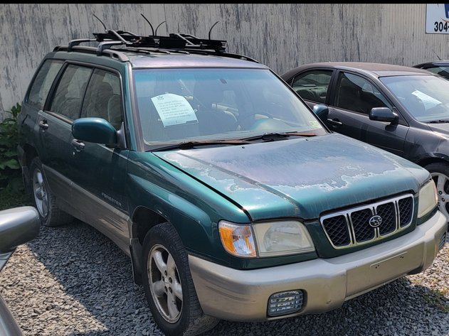 Image for Good News Mountaineer Garage Car Auction