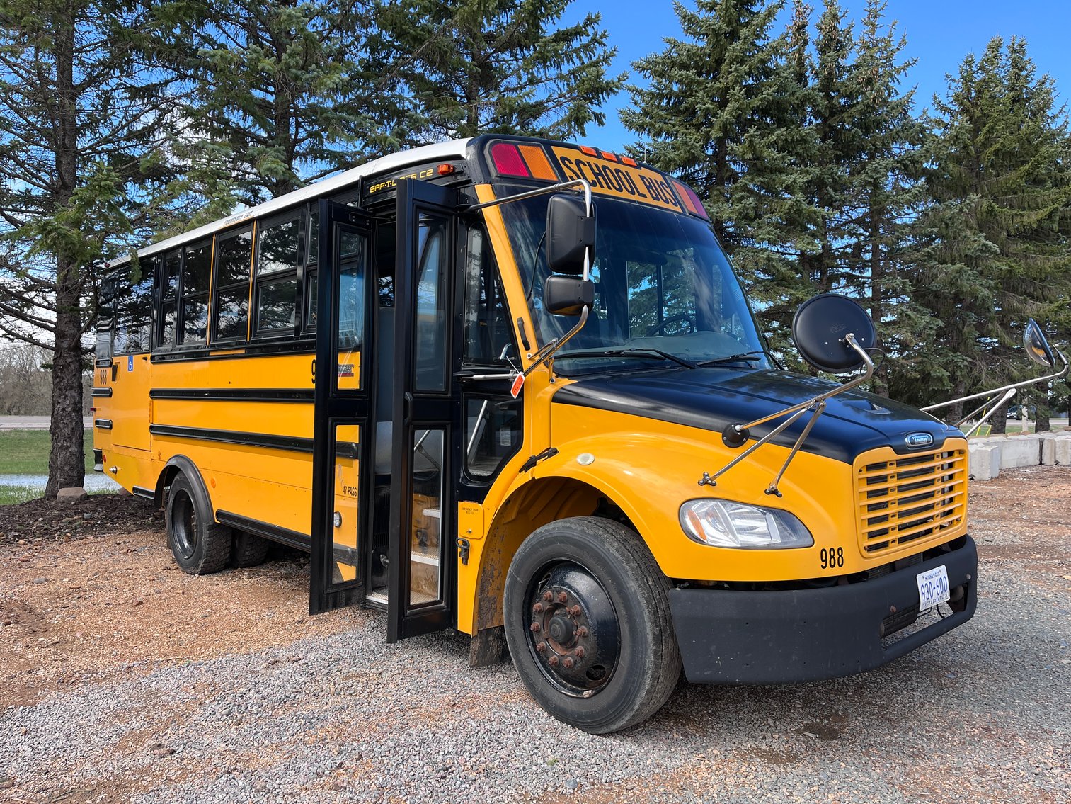 2019 Bobcat T595 Track Skid Steer & 2009 Thomas Freightliner Bus