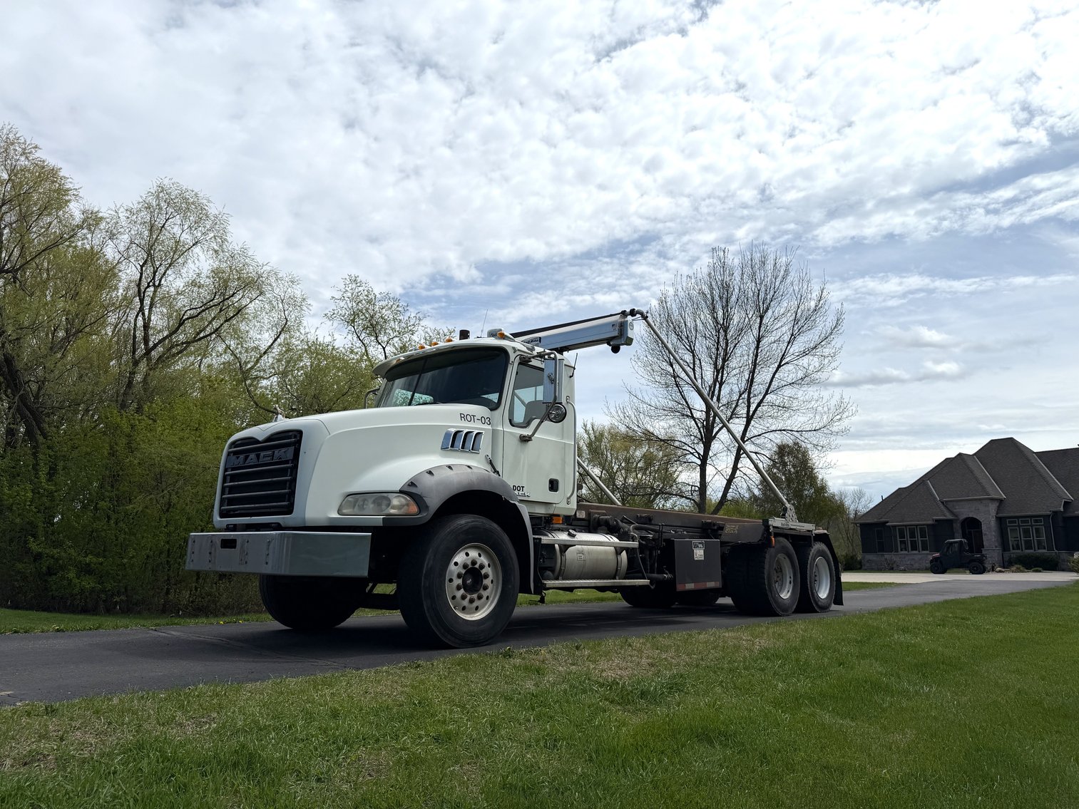 (3) Roll Off Trucks, Dumpsters, & Heavy Equipment