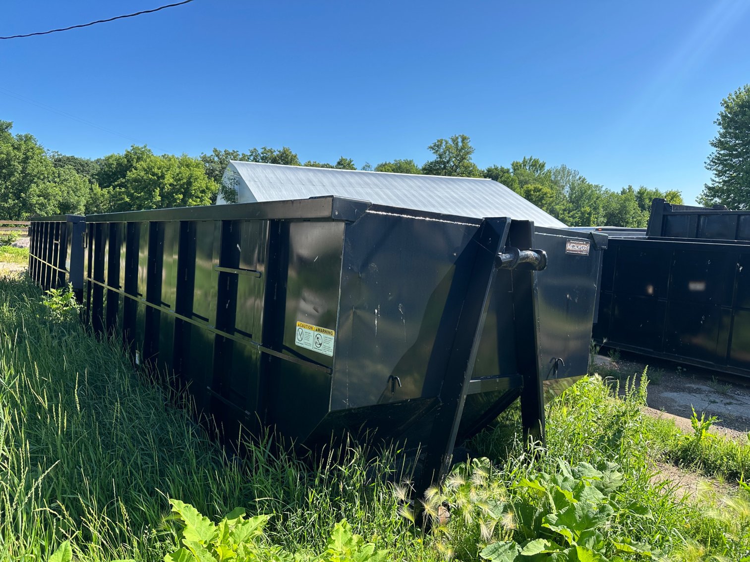 (2) Roll off Trucks & (26) Dumpsters