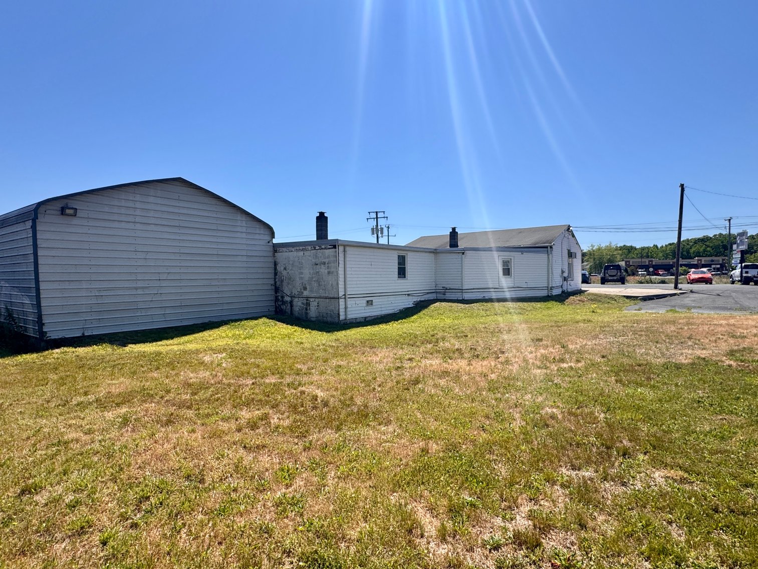 Image for Income Producing Commercial Building w/Office, Apartment & 2 Bay Garage/Shop on .46 +/- Acres w/Rts. 1 & 208 Visibility--ONLINE ONLY BIDDING!!