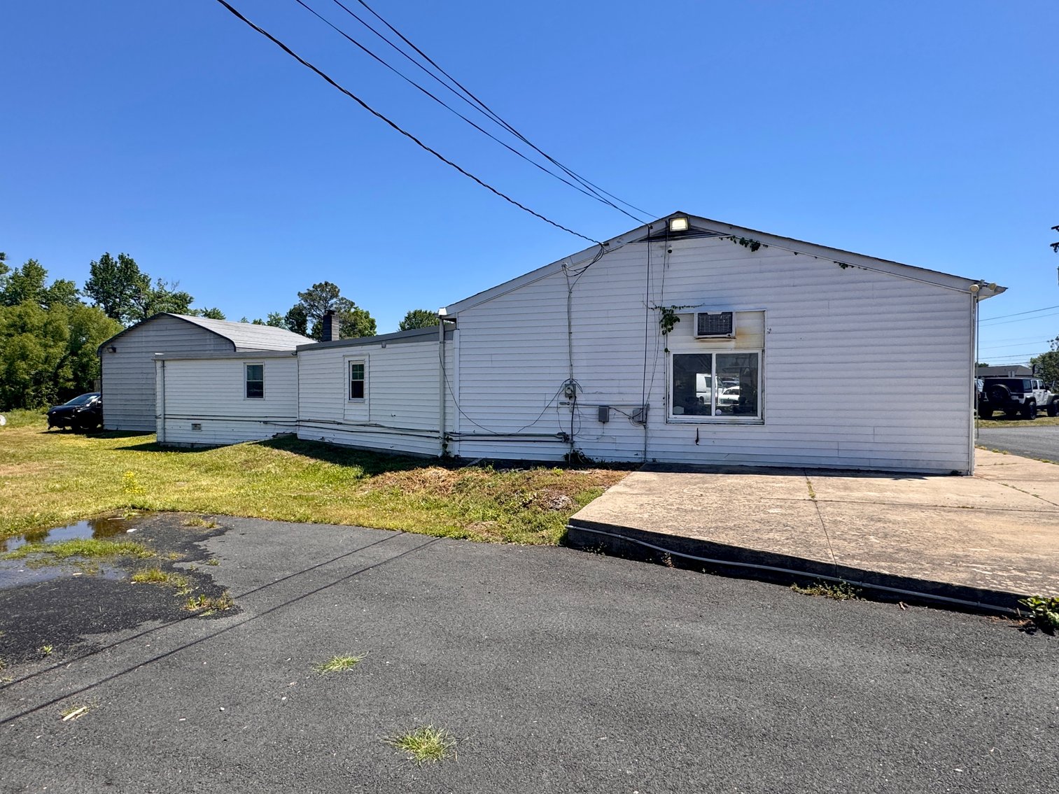Image for Income Producing Commercial Building w/Office, Apartment & 2 Bay Garage/Shop on .46 +/- Acres w/Rts. 1 & 208 Visibility--ONLINE ONLY BIDDING!!