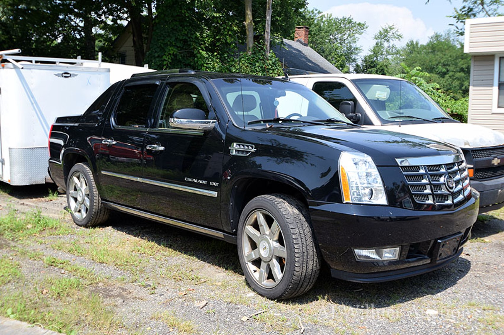 Image for Cargo Vans, Bucket Truck & Cadillac Escalade
