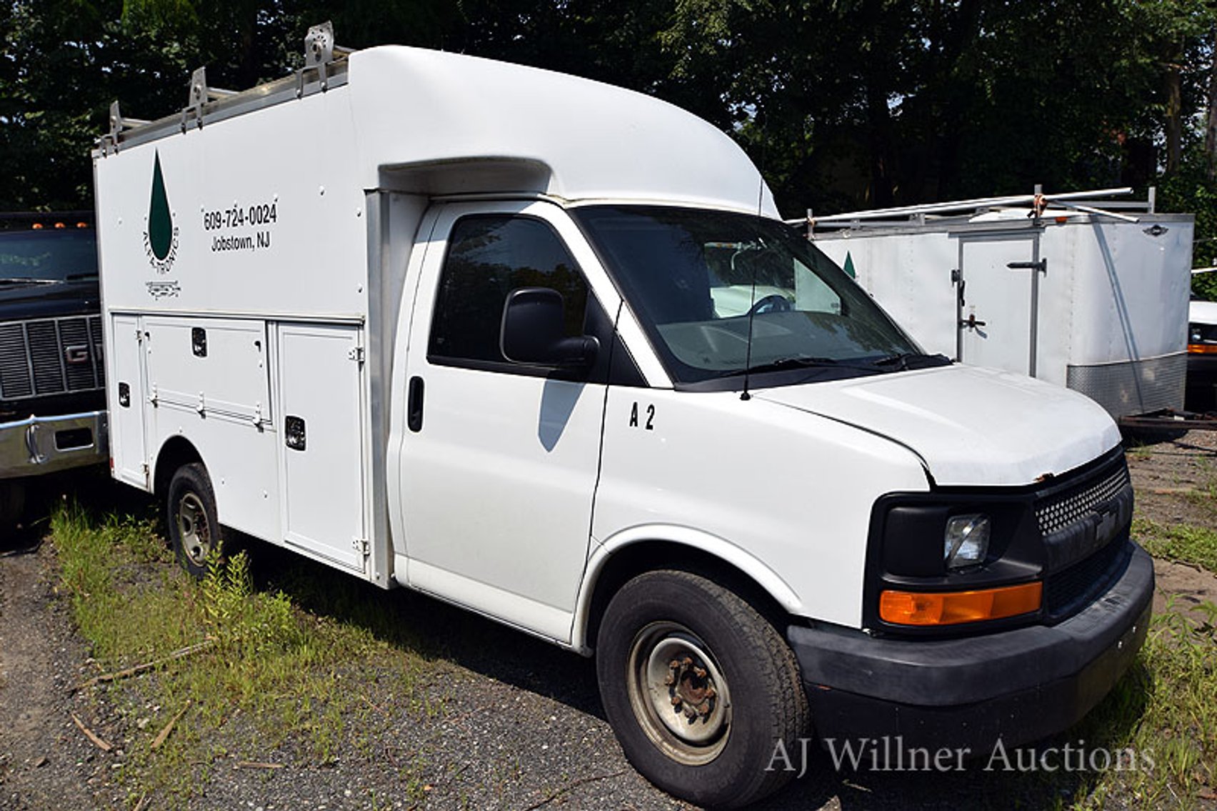 Image for Cargo Vans, Bucket Truck & Cadillac Escalade