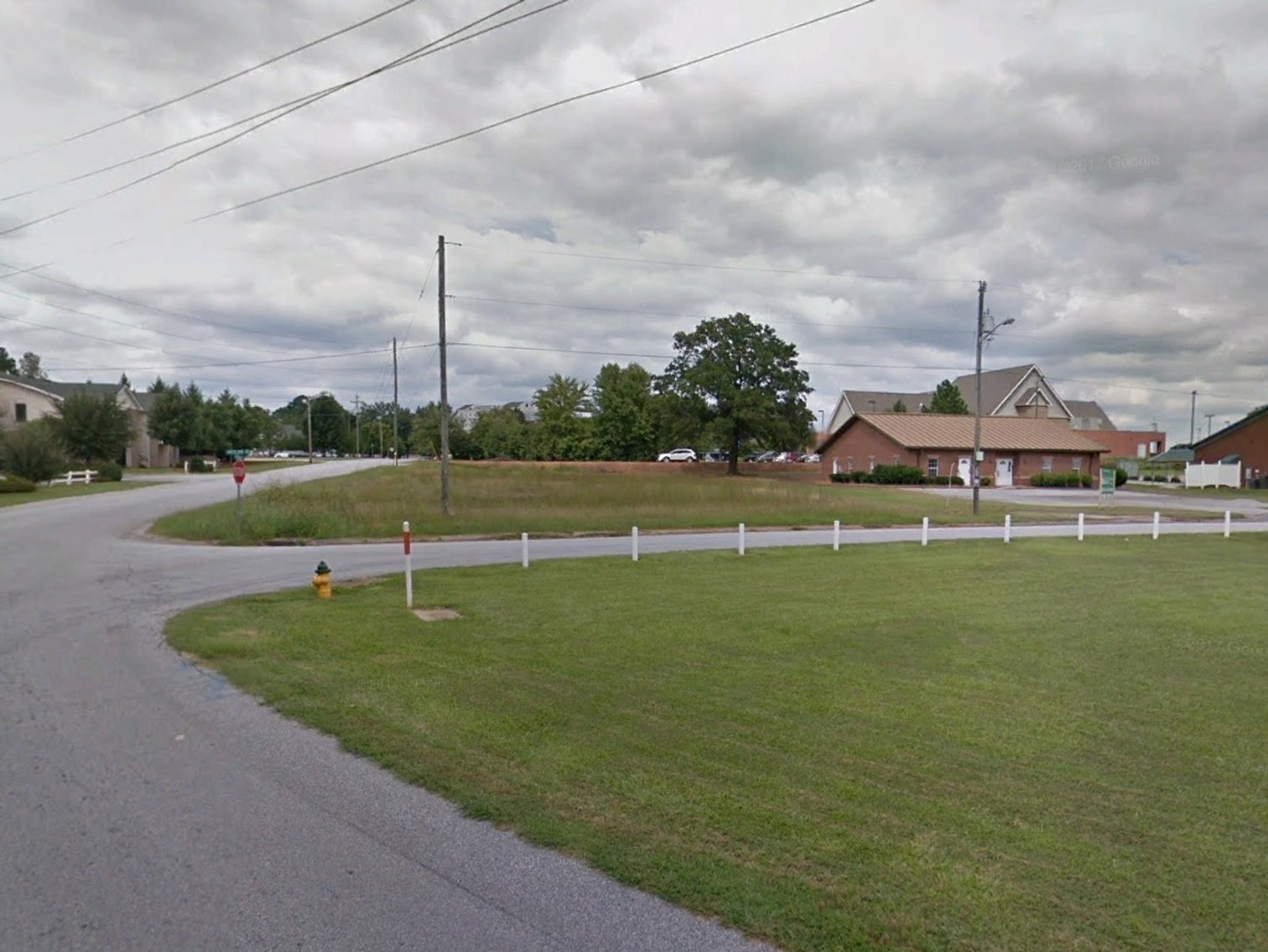 Image for Property #103: Greenwood, SC: .49± Acre Commercial Corner Lot (Lot 52) at Overland Dr. & Parkway (Beside 212 Overland Dr.), Greenwood, SC 29646 (Greenwood County)