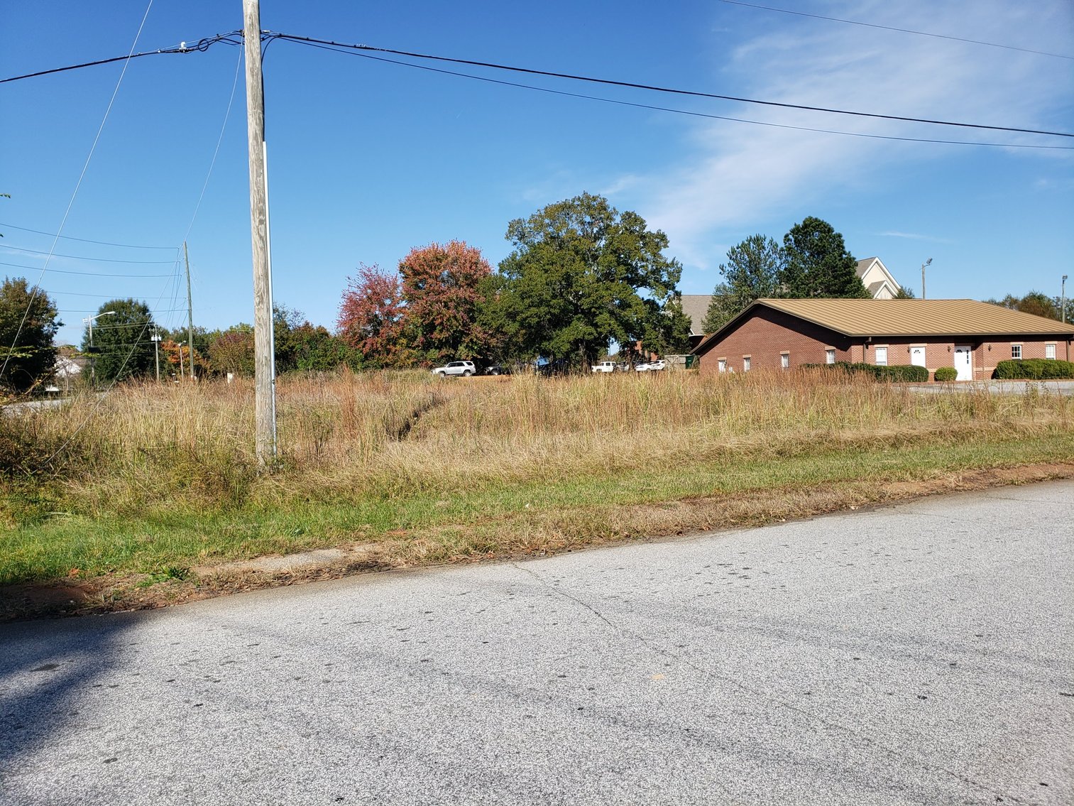 Image for Property #103: Greenwood, SC: .49± Acre Commercial Corner Lot (Lot 52) at Overland Dr. & Parkway (Beside 212 Overland Dr.), Greenwood, SC 29646 (Greenwood County)