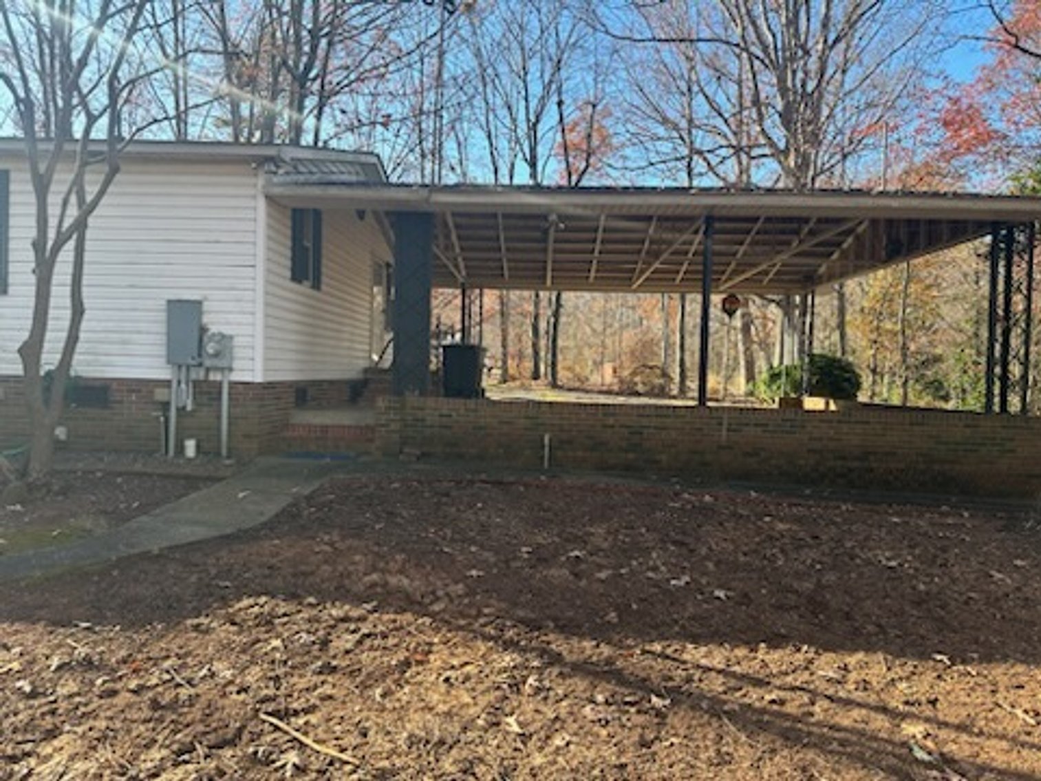 Troutman Home with 2+/- Acres and Multiple Out Buildings Auction