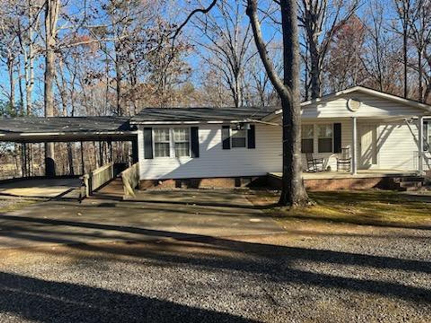 Troutman Home with 2+/- Acres and Multiple Out Buildings Auction