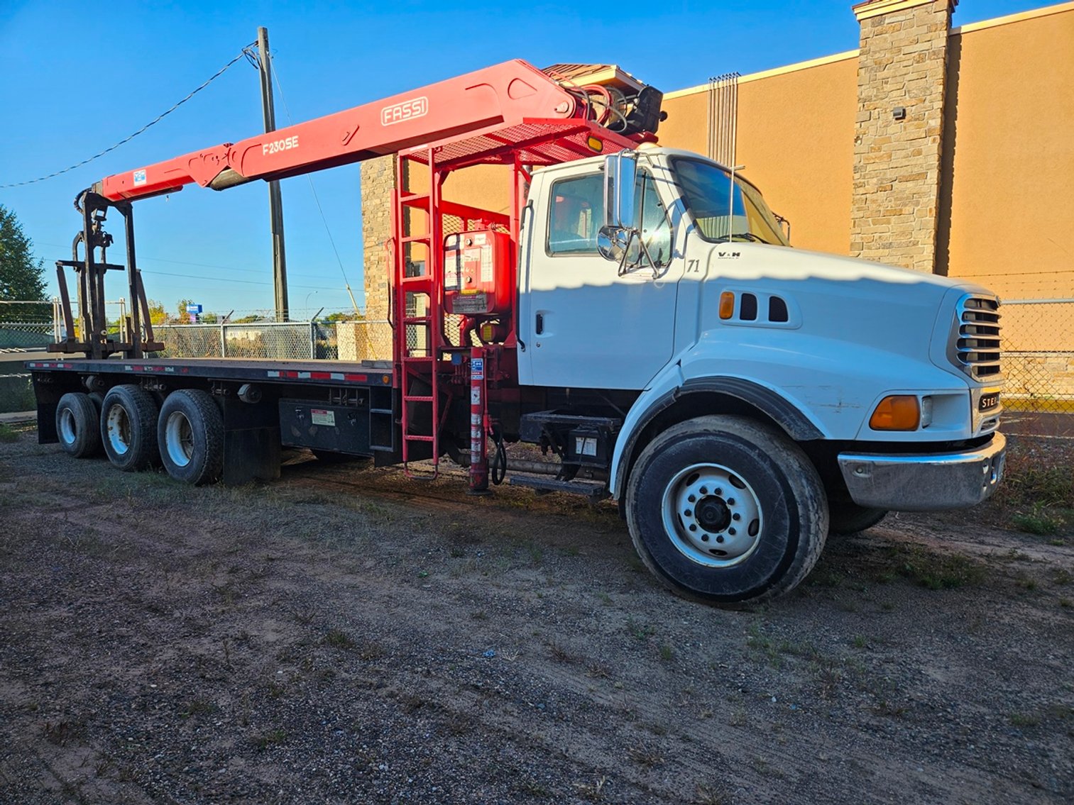 Image for Sterling Boom Truck, International Box Truck and Felling Trailer