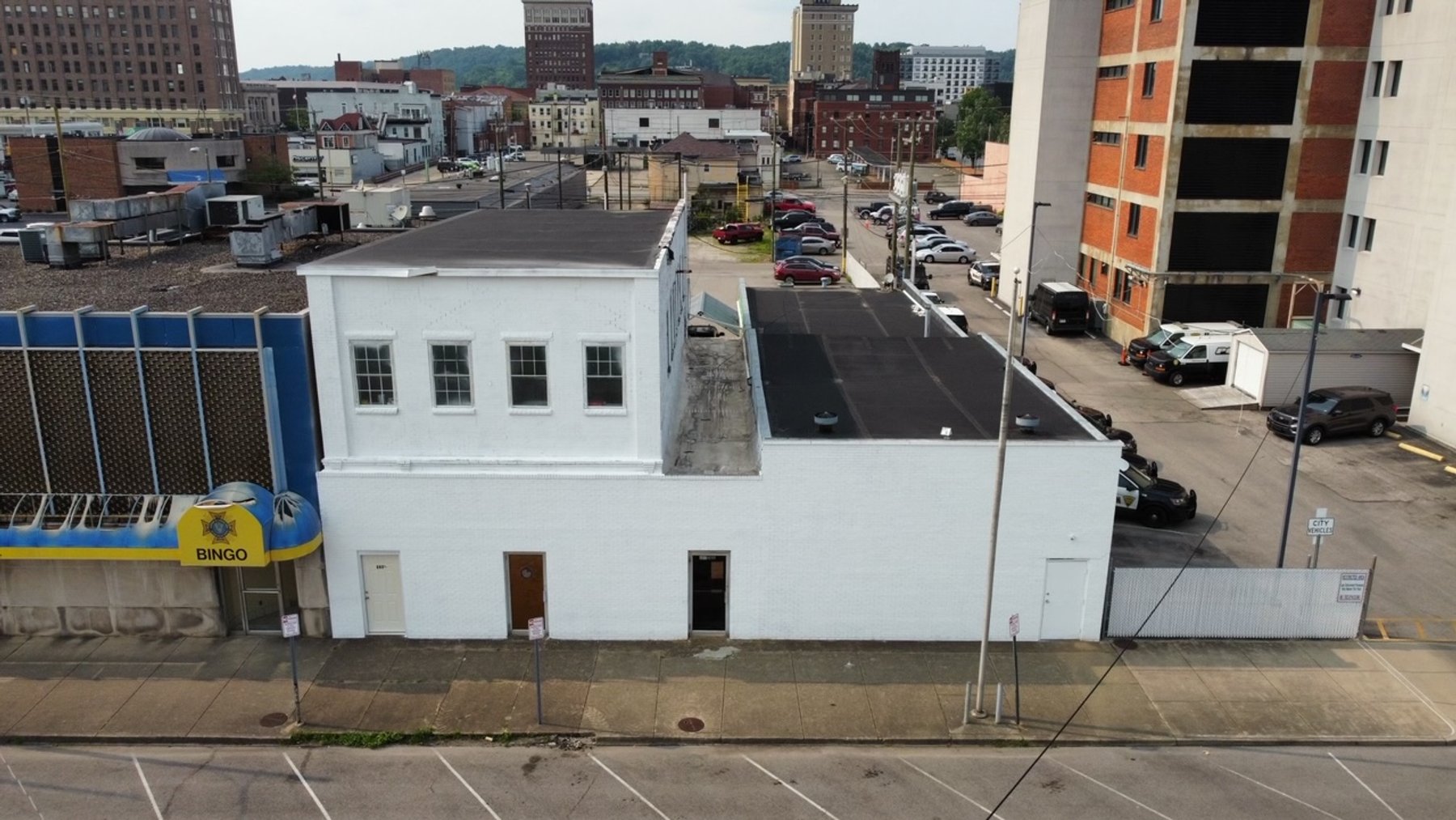 Image for SOLD $176,000 - 2 Commercial Store Fronts with Income Generating Apartment in Huntington