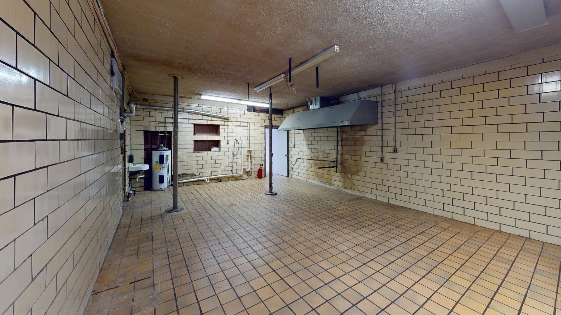 Image for SOLD $176,000 - 2 Commercial Store Fronts with Income Generating Apartment in Huntington