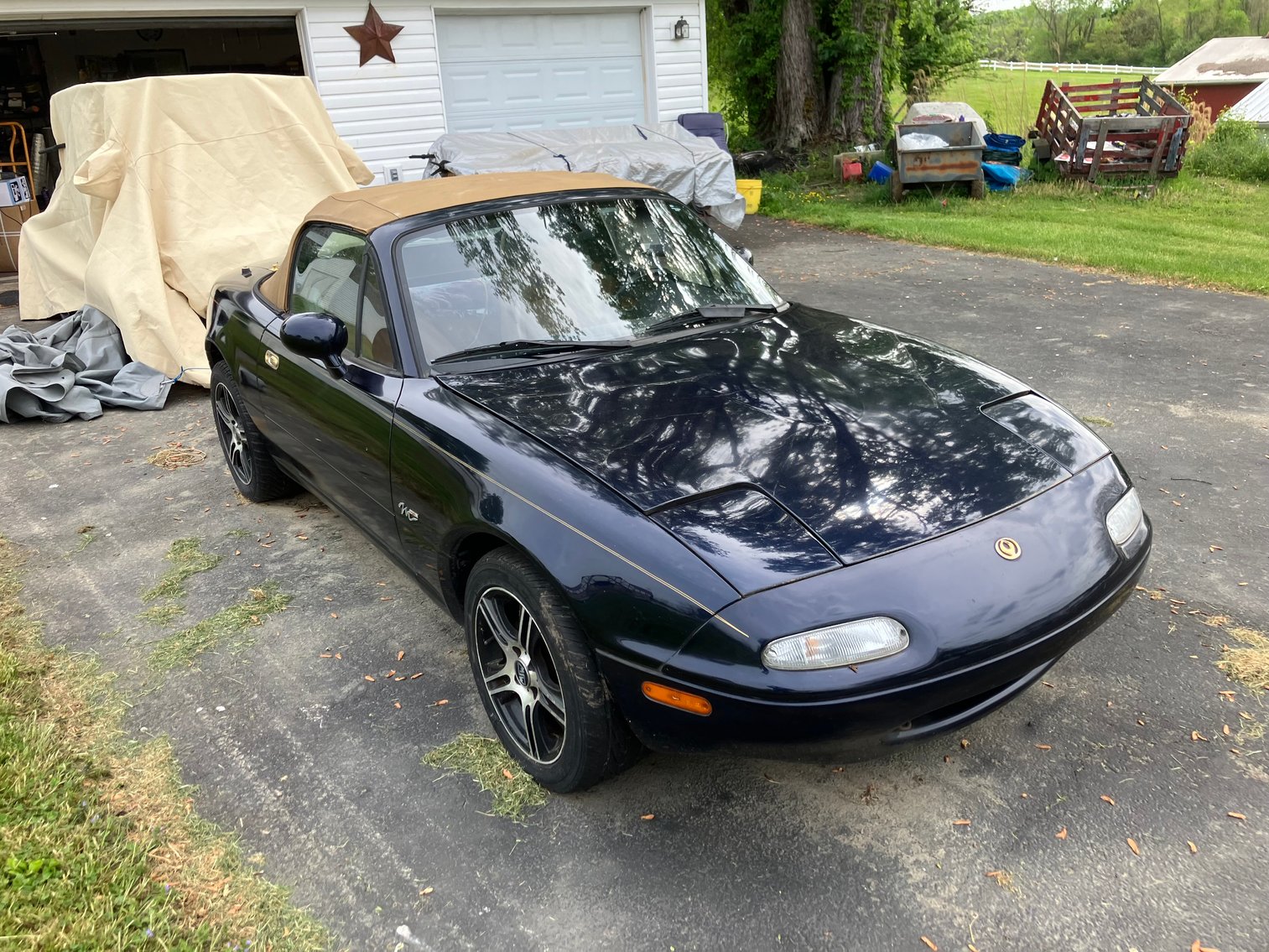 Image for Uniontown, PA – Moving Auction: 1996 Miata, 1926 Ford Model T Street Rod Project, Car Parts, Antiques, Home Furnishings, and More!