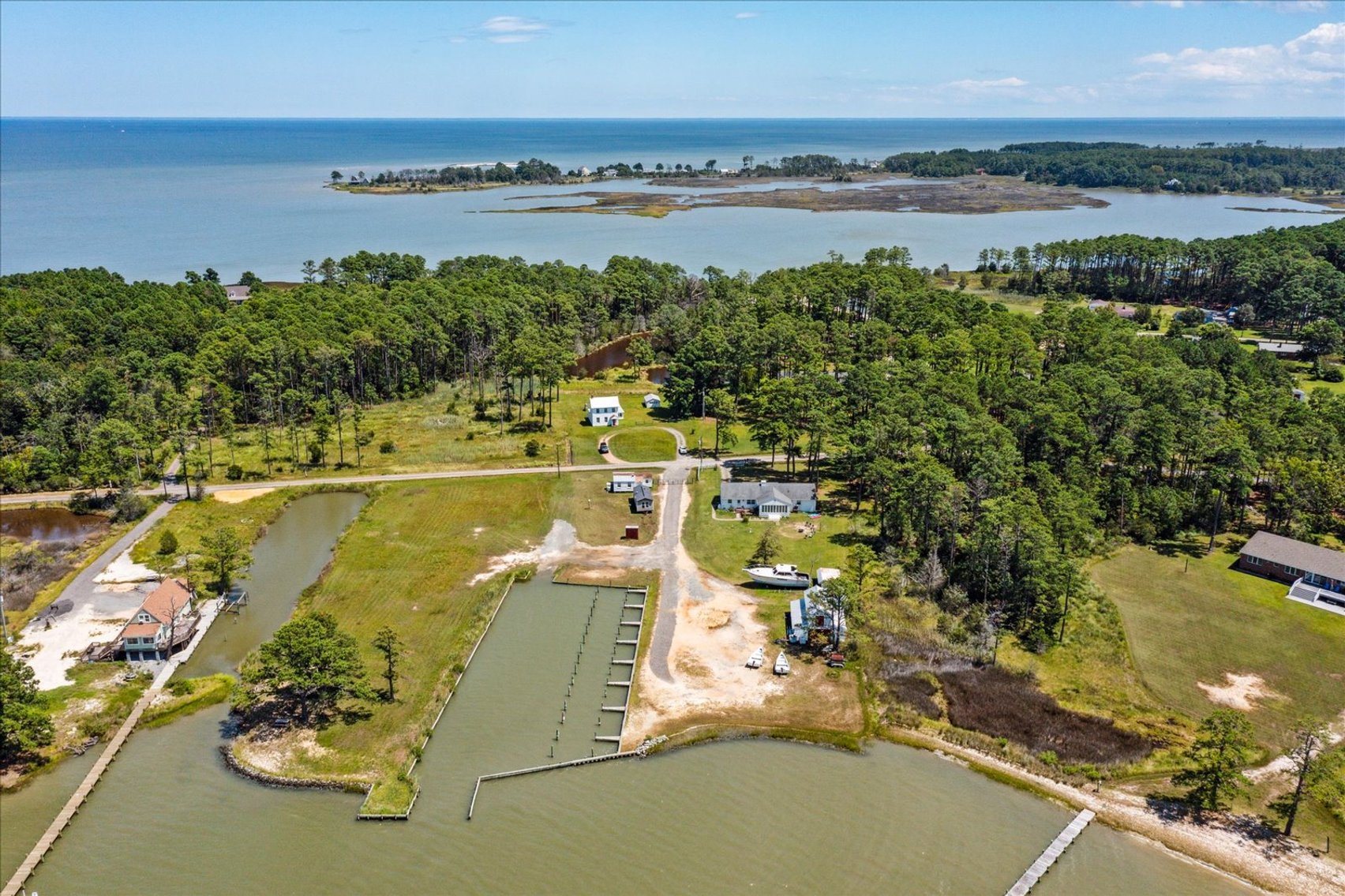 Image for Income Producing Waterfront Estate Mathews VA - Potential Annual Income $138,500 - Ranch Home - Guest Cottage -  Boat Ramp and 15 Slips - Fronting Billups Creek; 967 Lillys Neck Rd