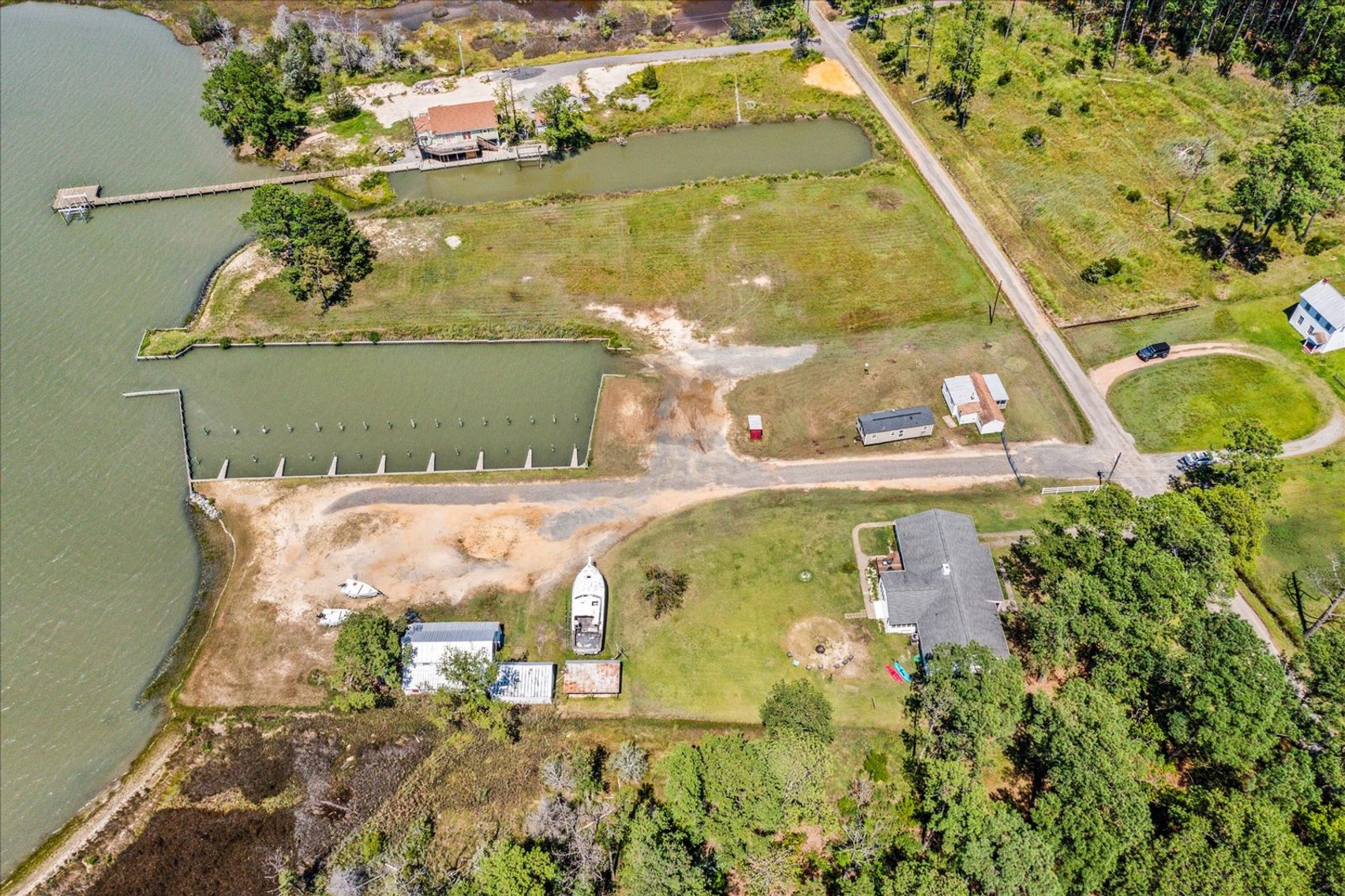 Image for Income Producing Waterfront Estate Mathews VA - Potential Annual Income $138,500 - Ranch Home - Guest Cottage -  Boat Ramp and 15 Slips - Fronting Billups Creek; 967 Lillys Neck Rd