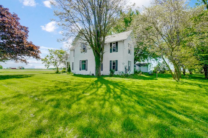Country Home with Pond and Pole Barn
