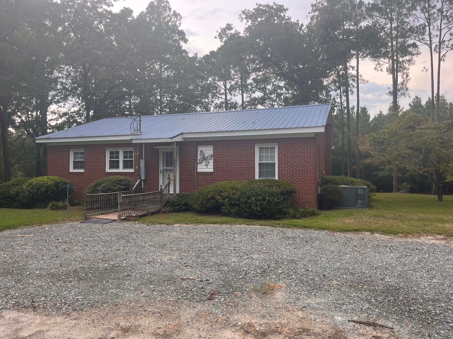 Image for 43 acres in Harnett County with a brick home in an onsite live /online / simulcast auction event!