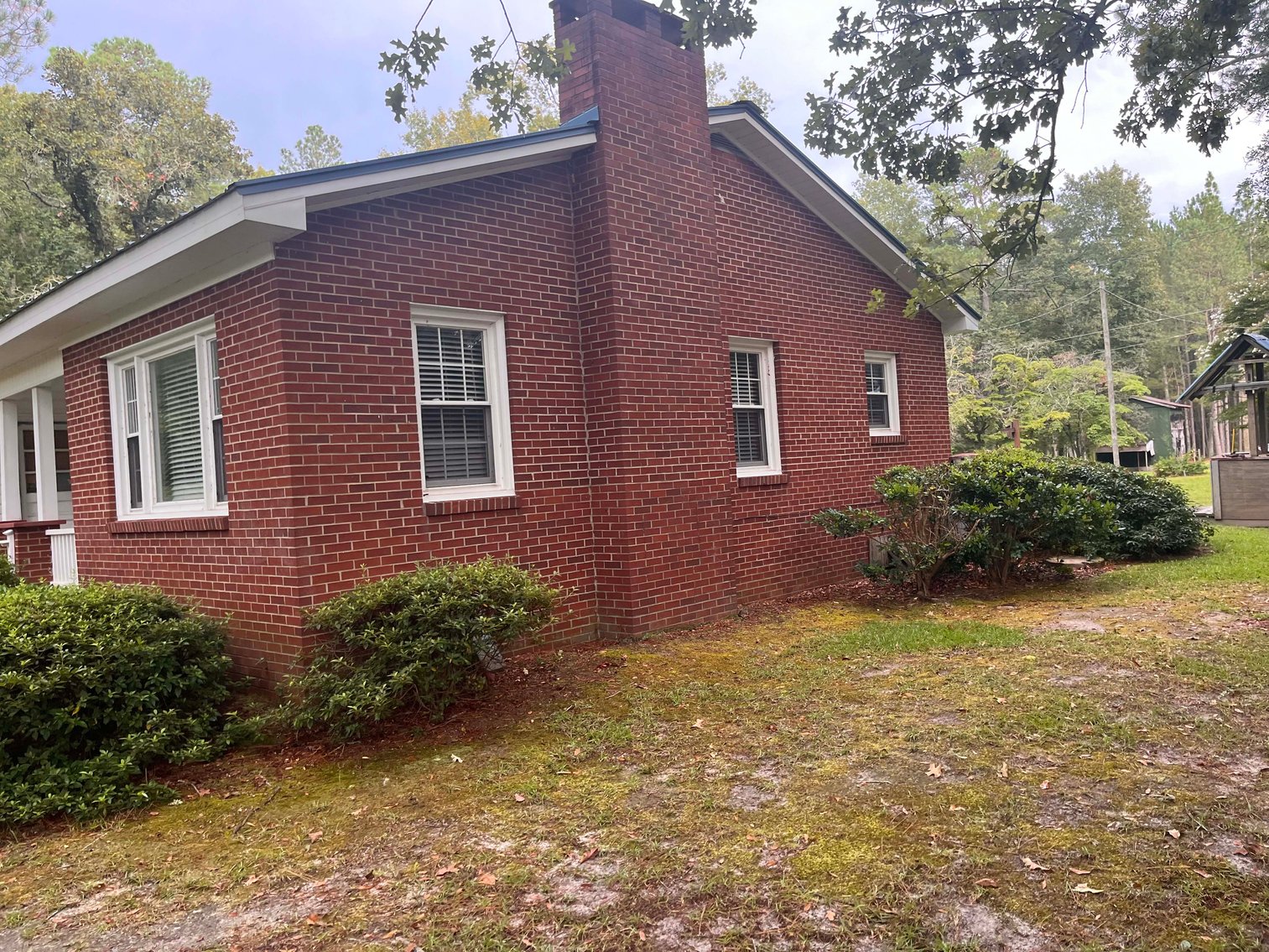 Image for 43 acres in Harnett County with a brick home in an onsite live /online / simulcast auction event!