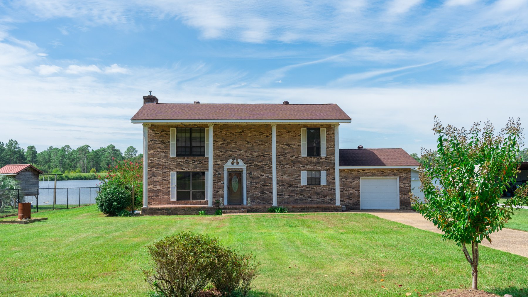 Image for Indian Lake Retreat - Waterfront Colonial Brick Home in Colquitt County, Georgia